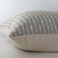 beige striped throw pillow