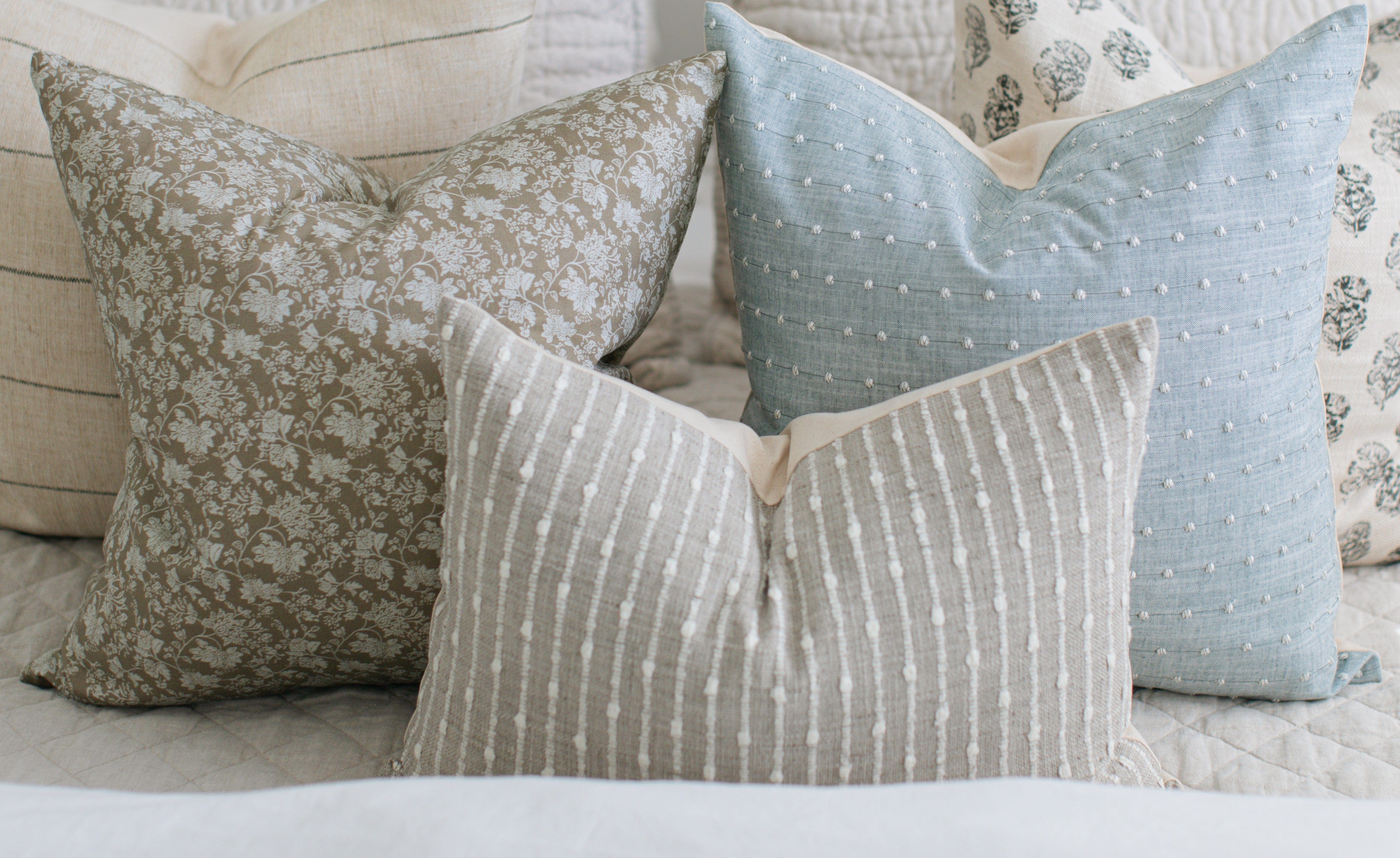 blue brown gray decorative pillows