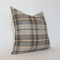 cream and brown plaid pillow 