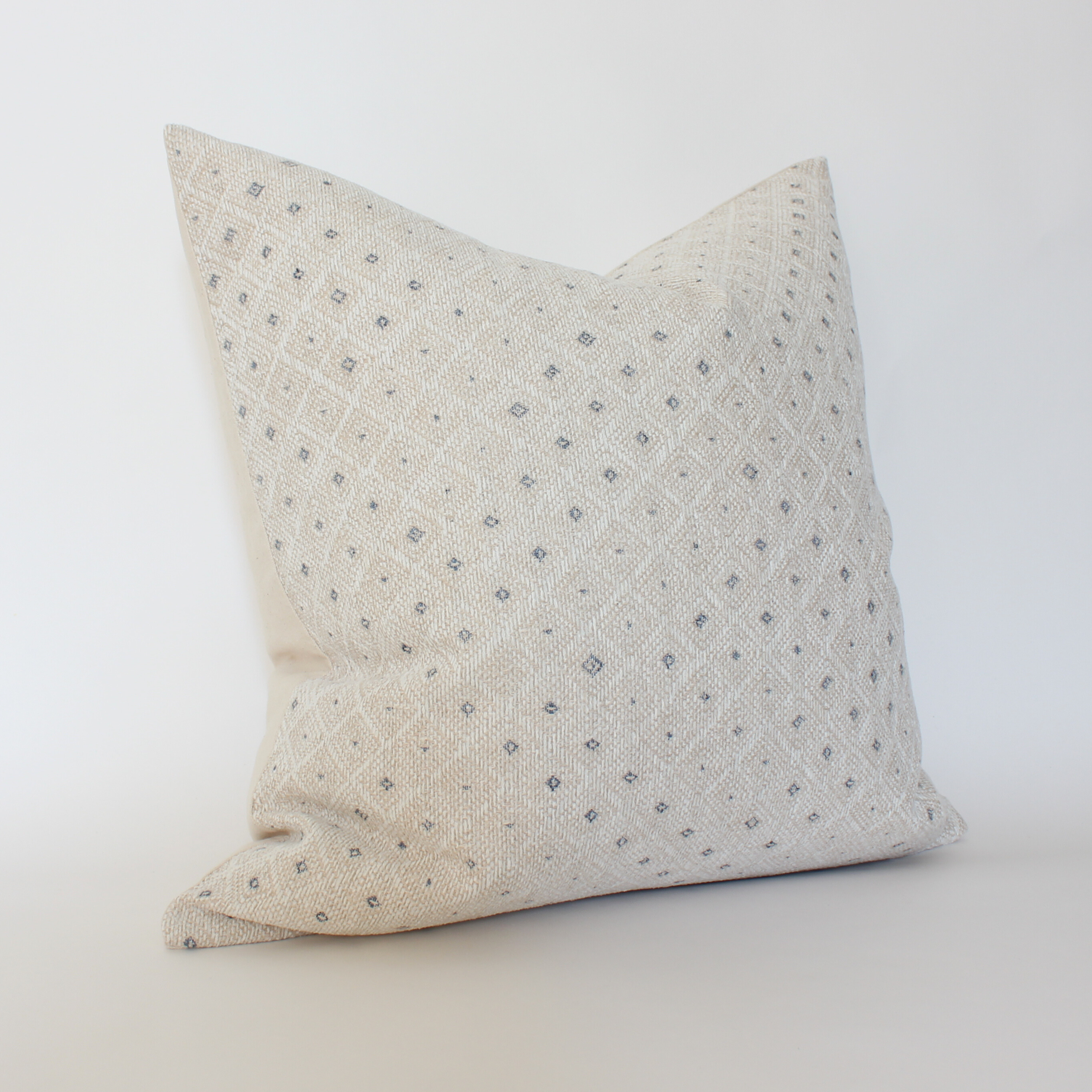 cream blue speckled pillow cover