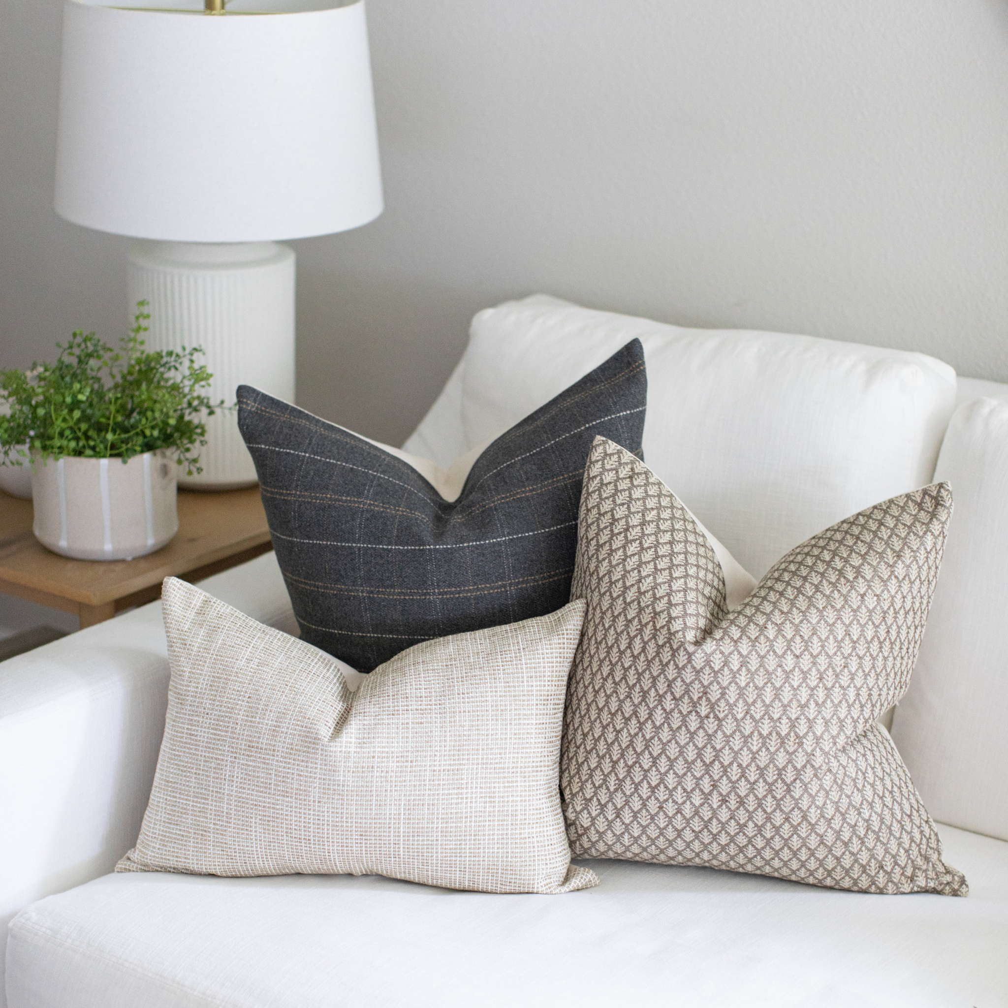 earthy pillow set of 3 on cream sofa