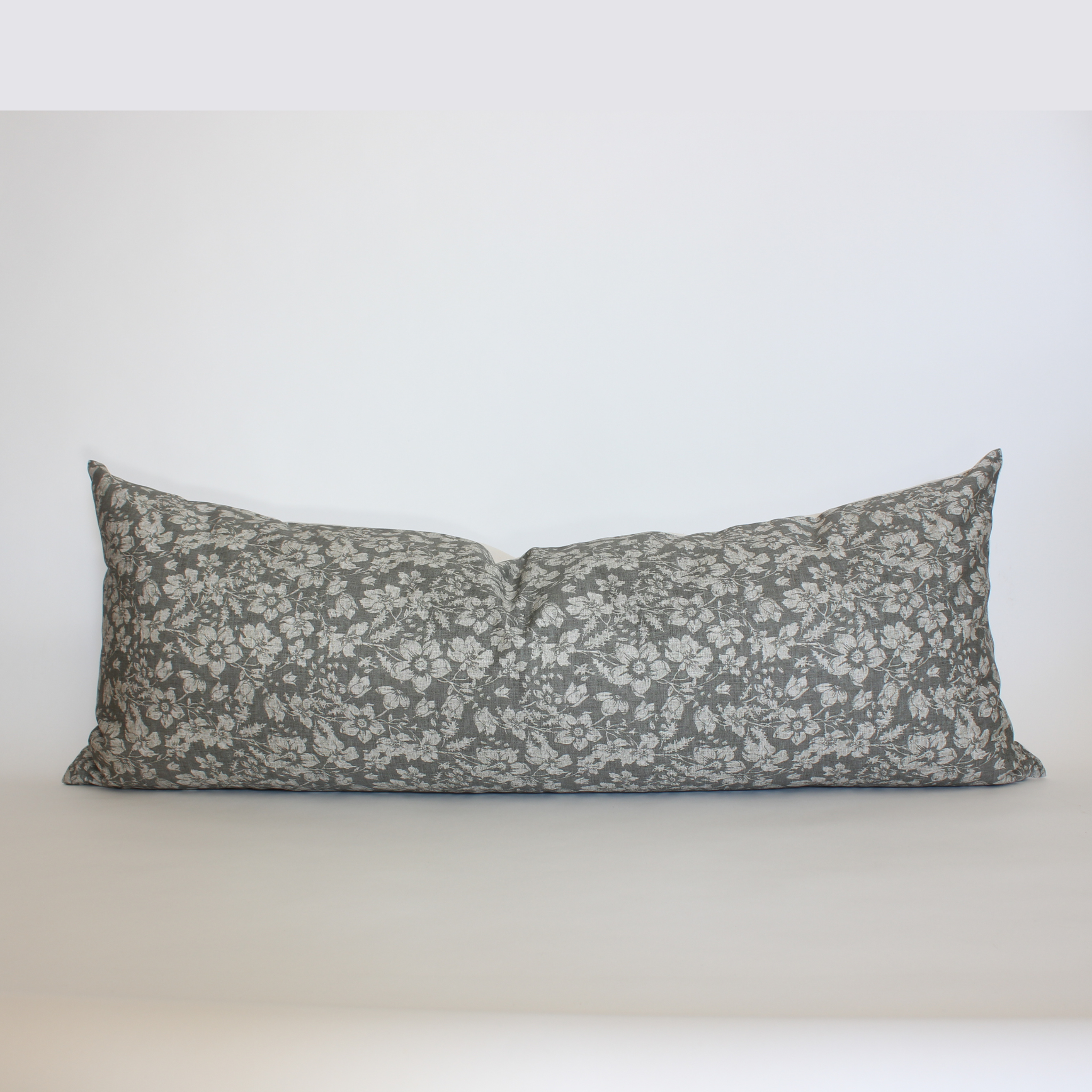 Charcoal gray floral long lumbar pillow cover with cream botanical print, transitional home decor
