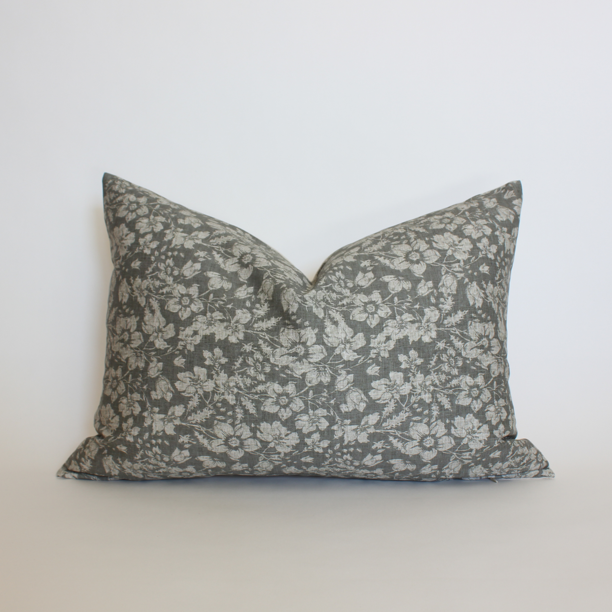 Gray botanical lumbar throw pillow cover with cream wildflower detail, coastal home decor accent pillow