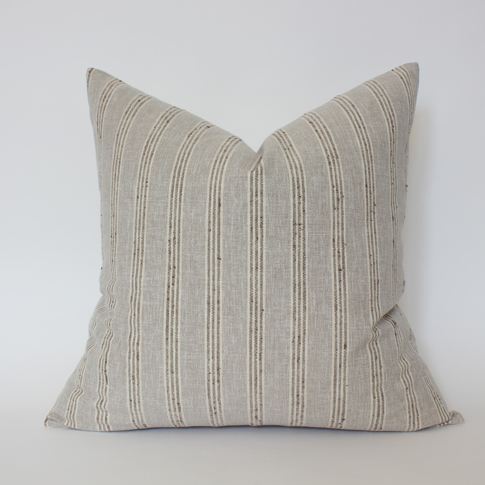 Striped pillow on a white background