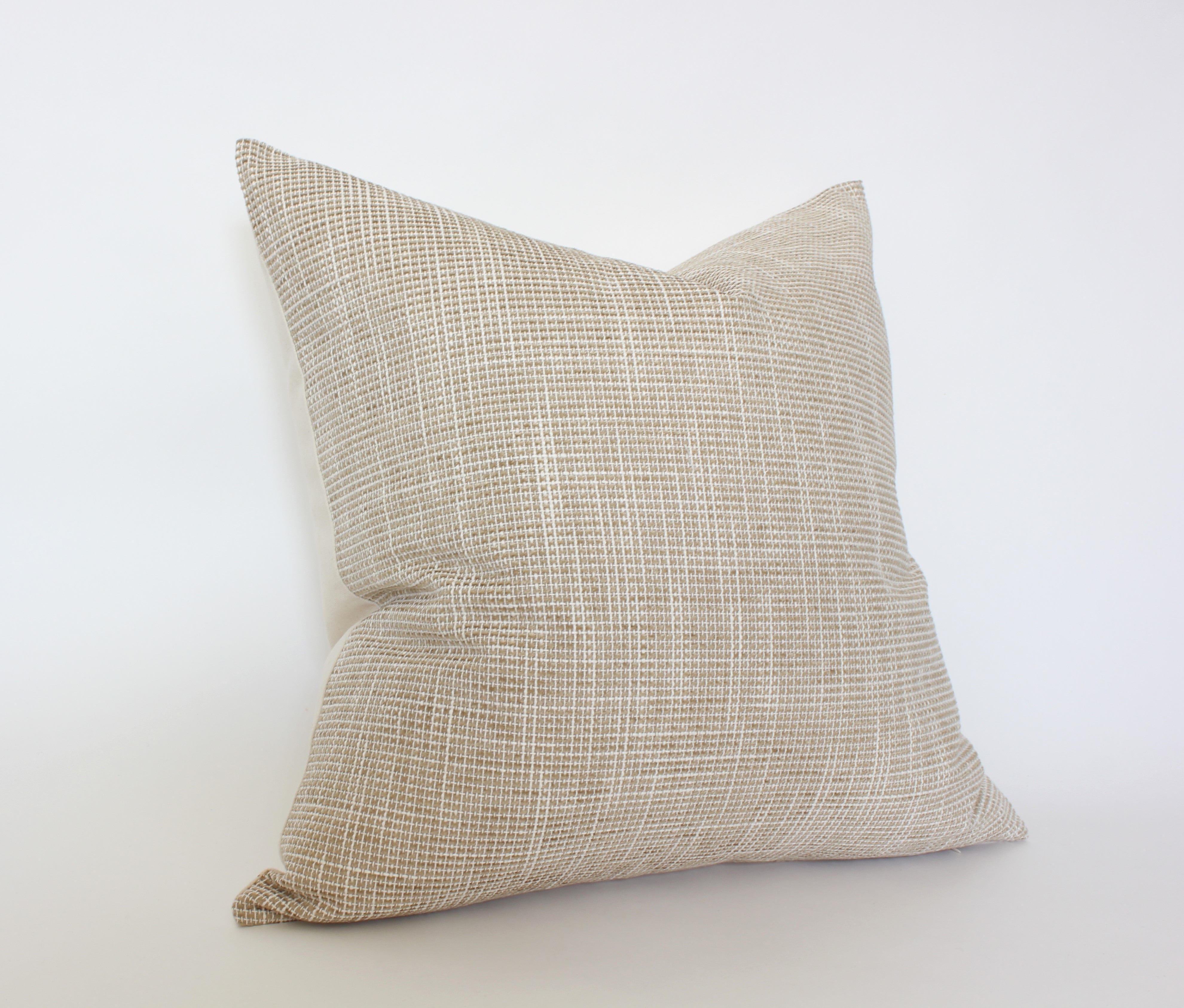 light neutral throw pillow