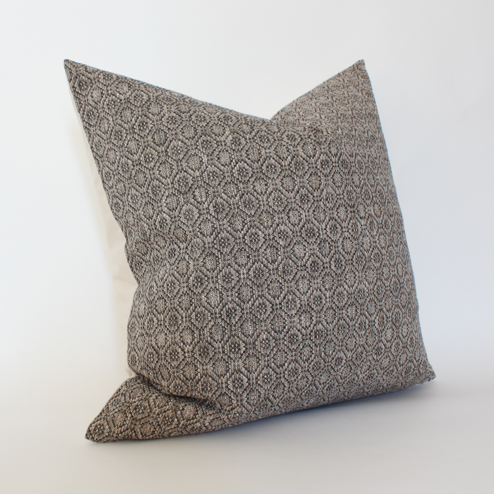 modern neutral patterned throw pillow