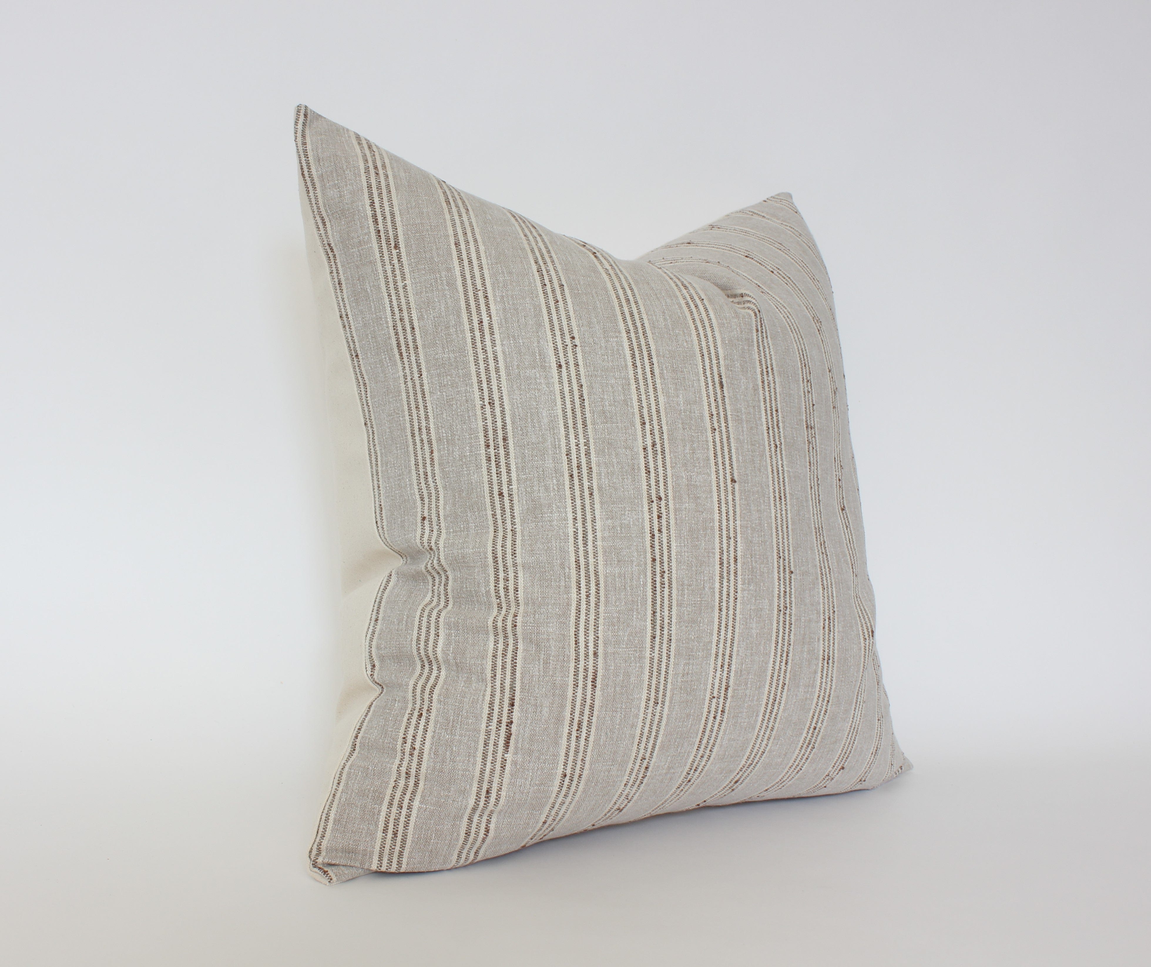 neutral beige throw pillow 