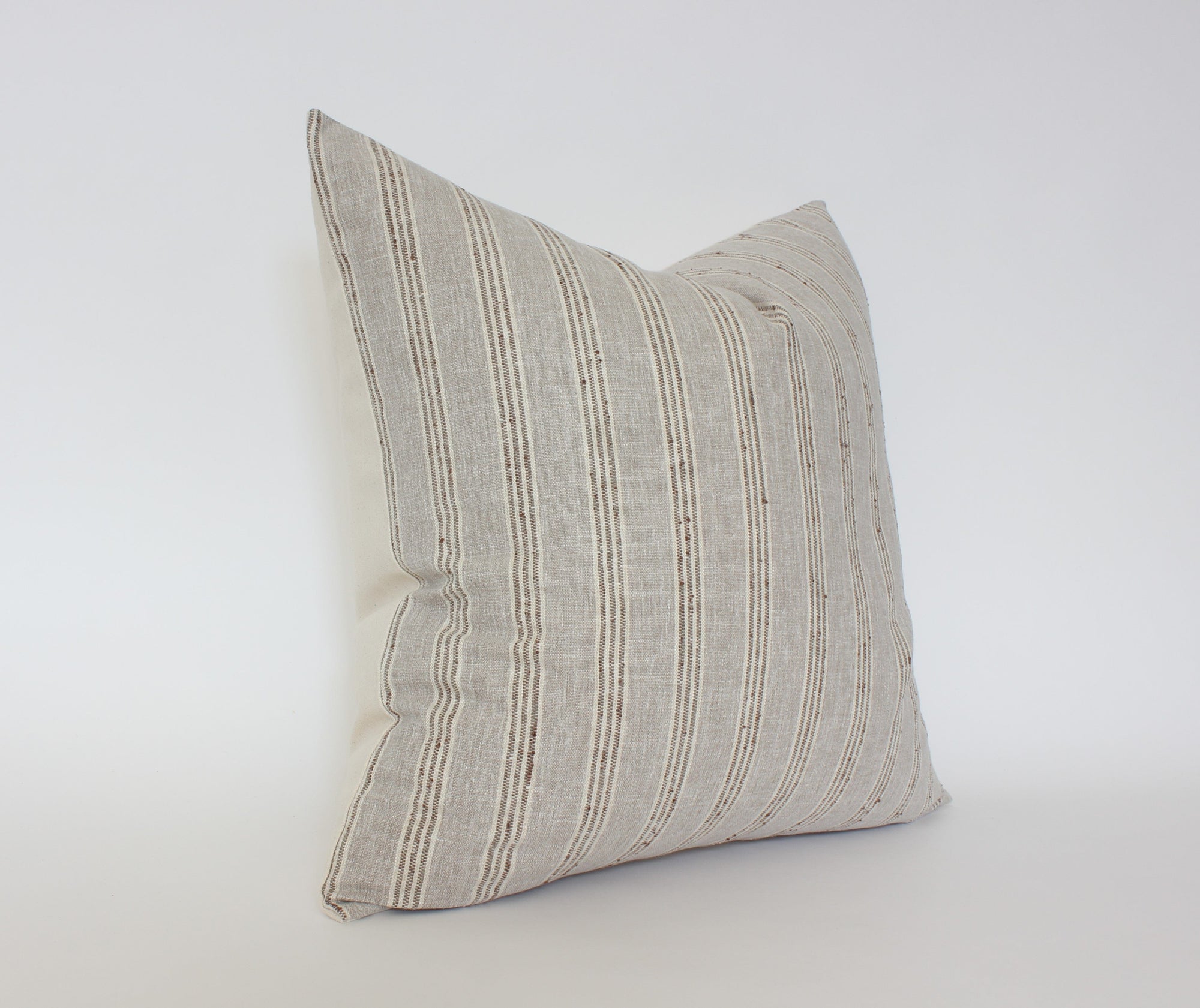 neutral beige throw pillow 