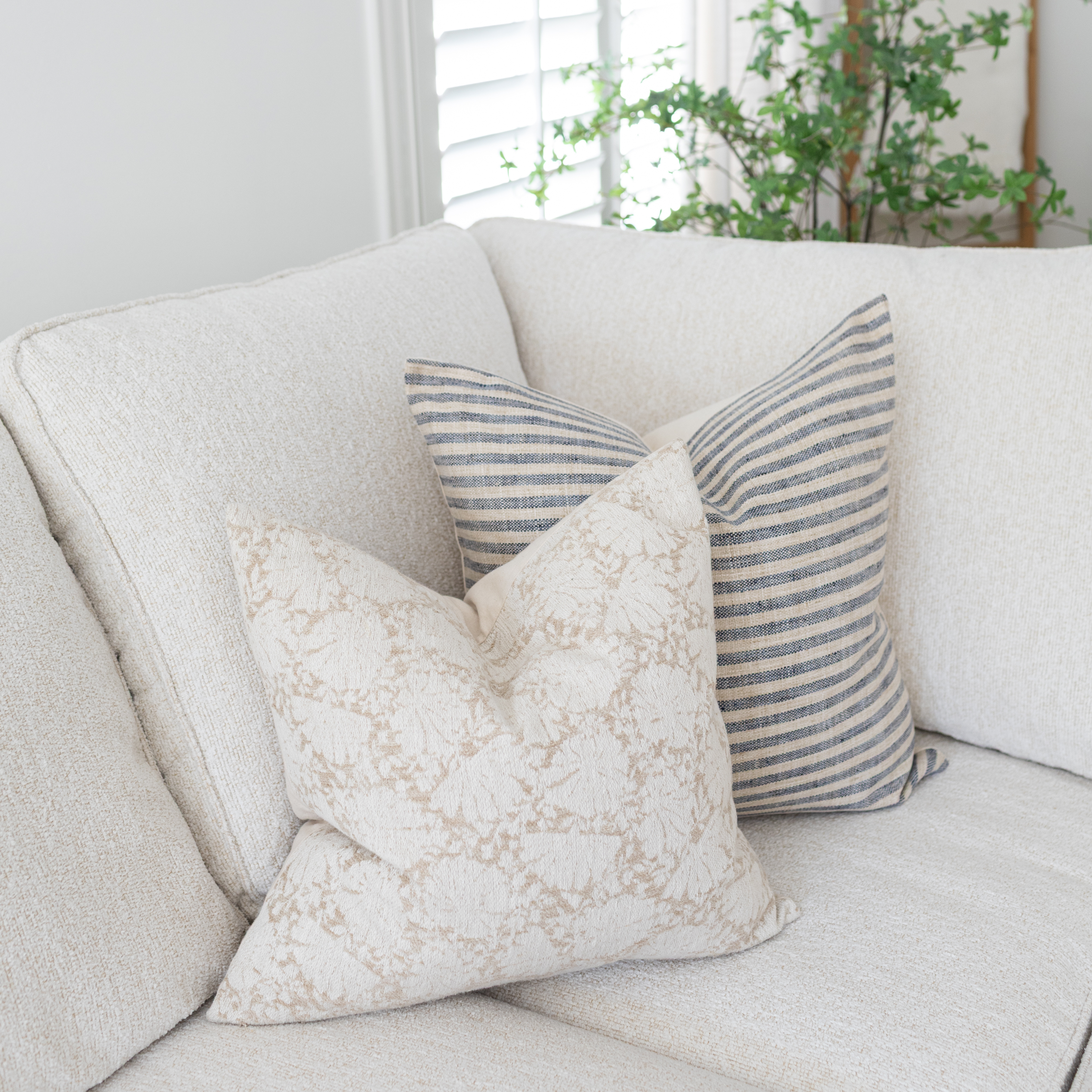 neutral blue cream pillows