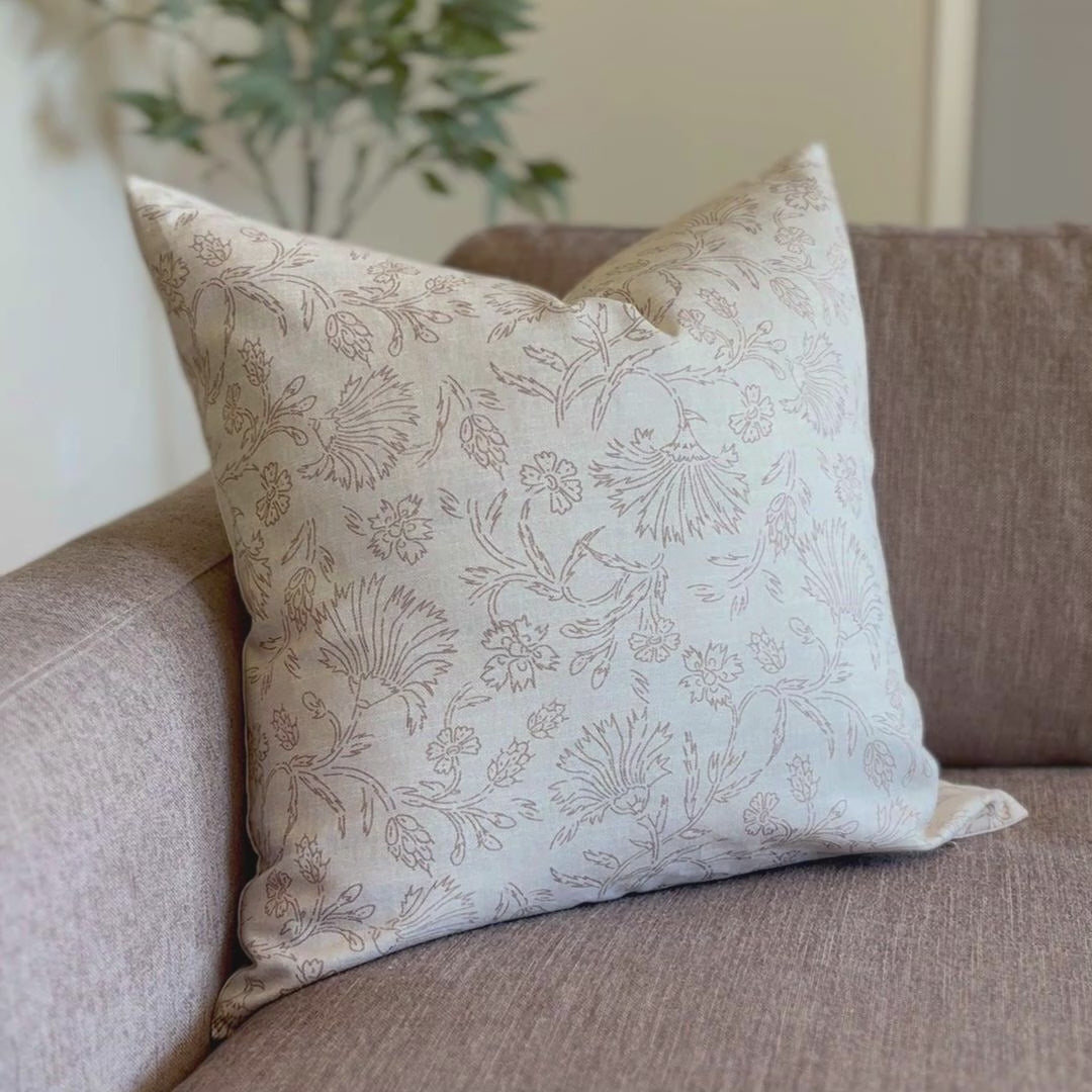 Cream floral pillow cover styled on sofa with plants, transitional living room accent pillow