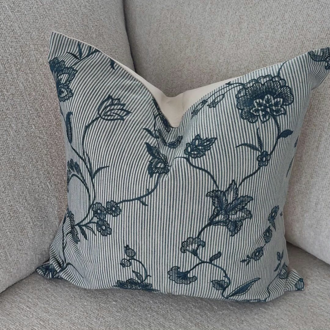 light blue floral throw pillow
