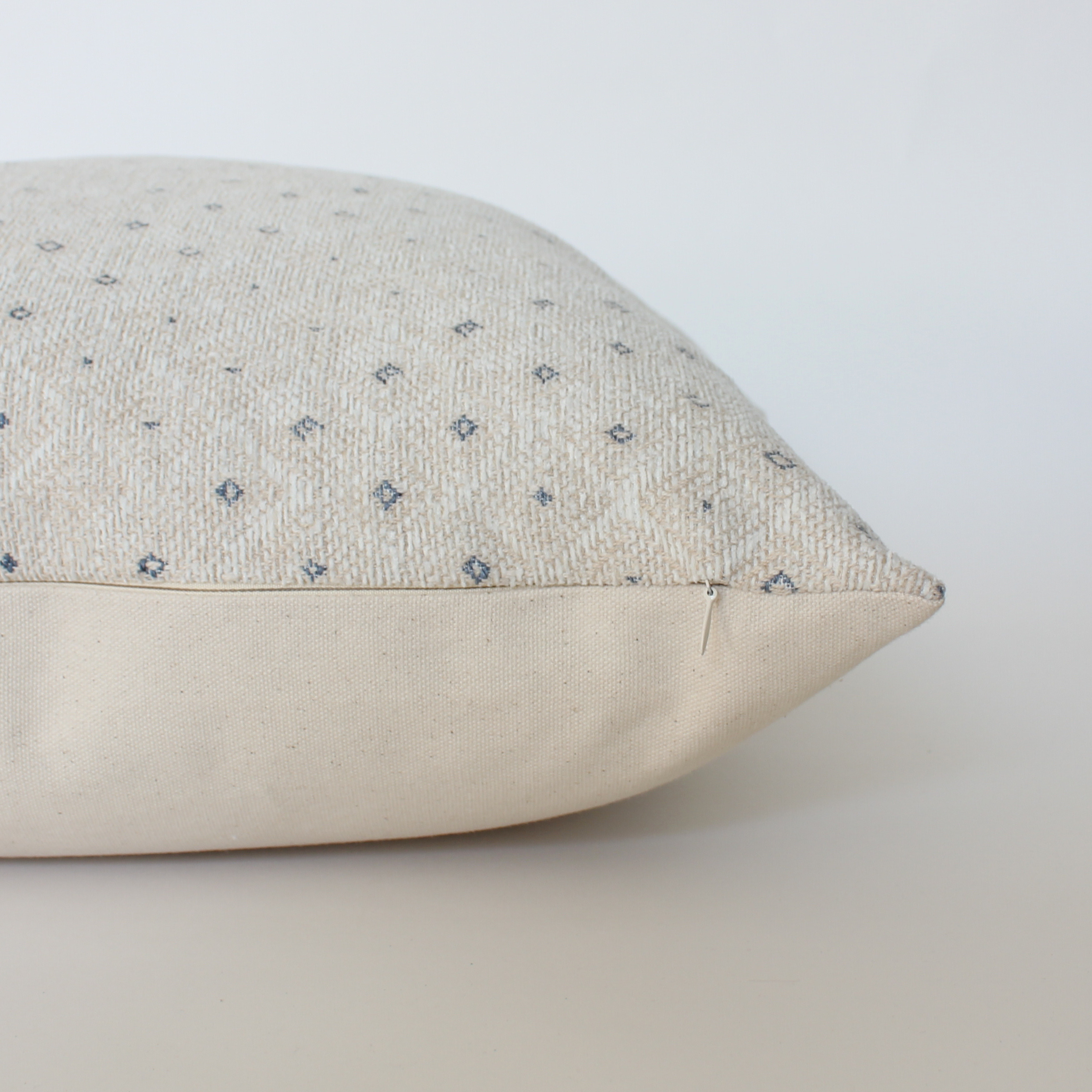 subtle geometric neutral throw pillow