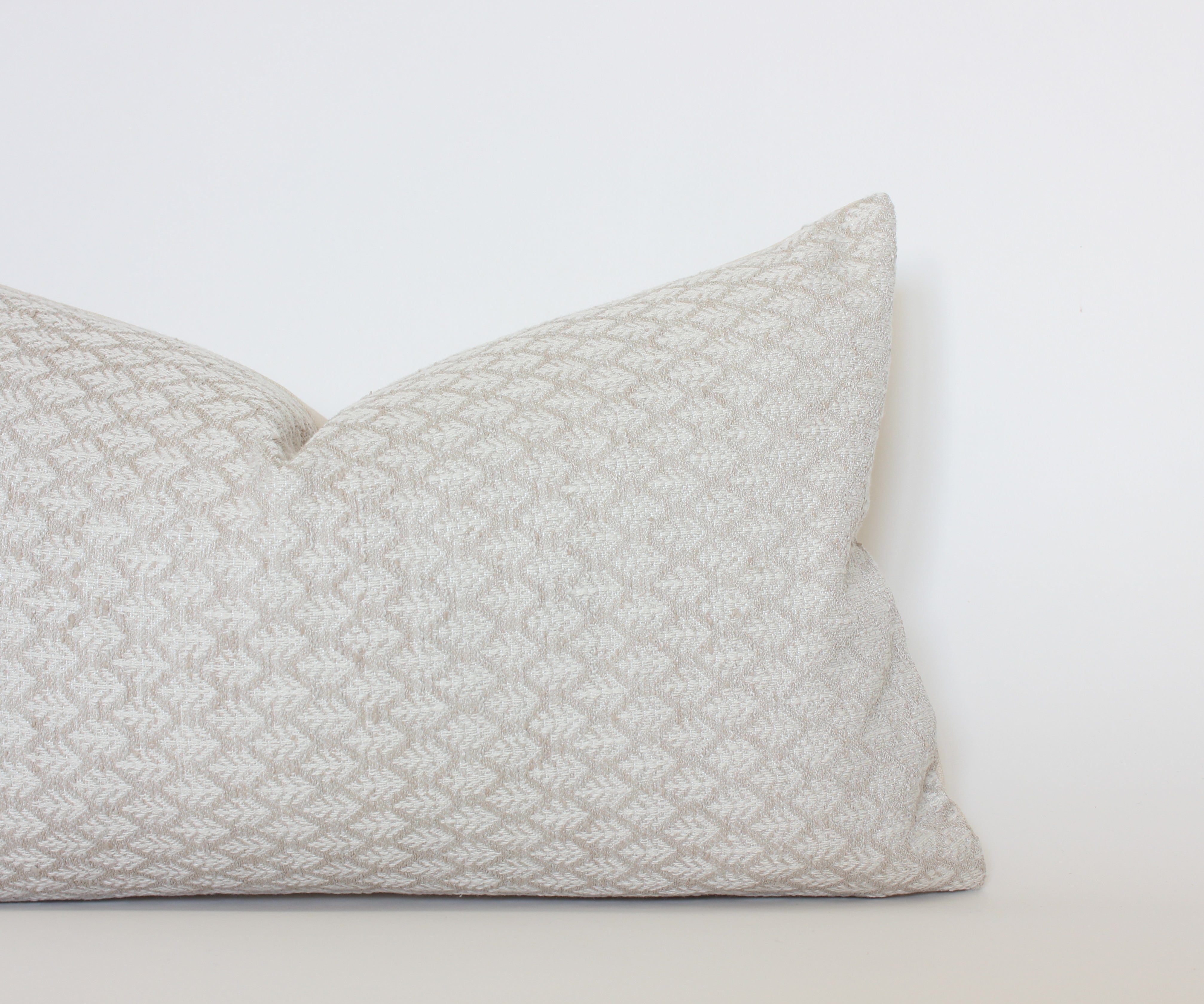 tan ivory lumbar throw pillow