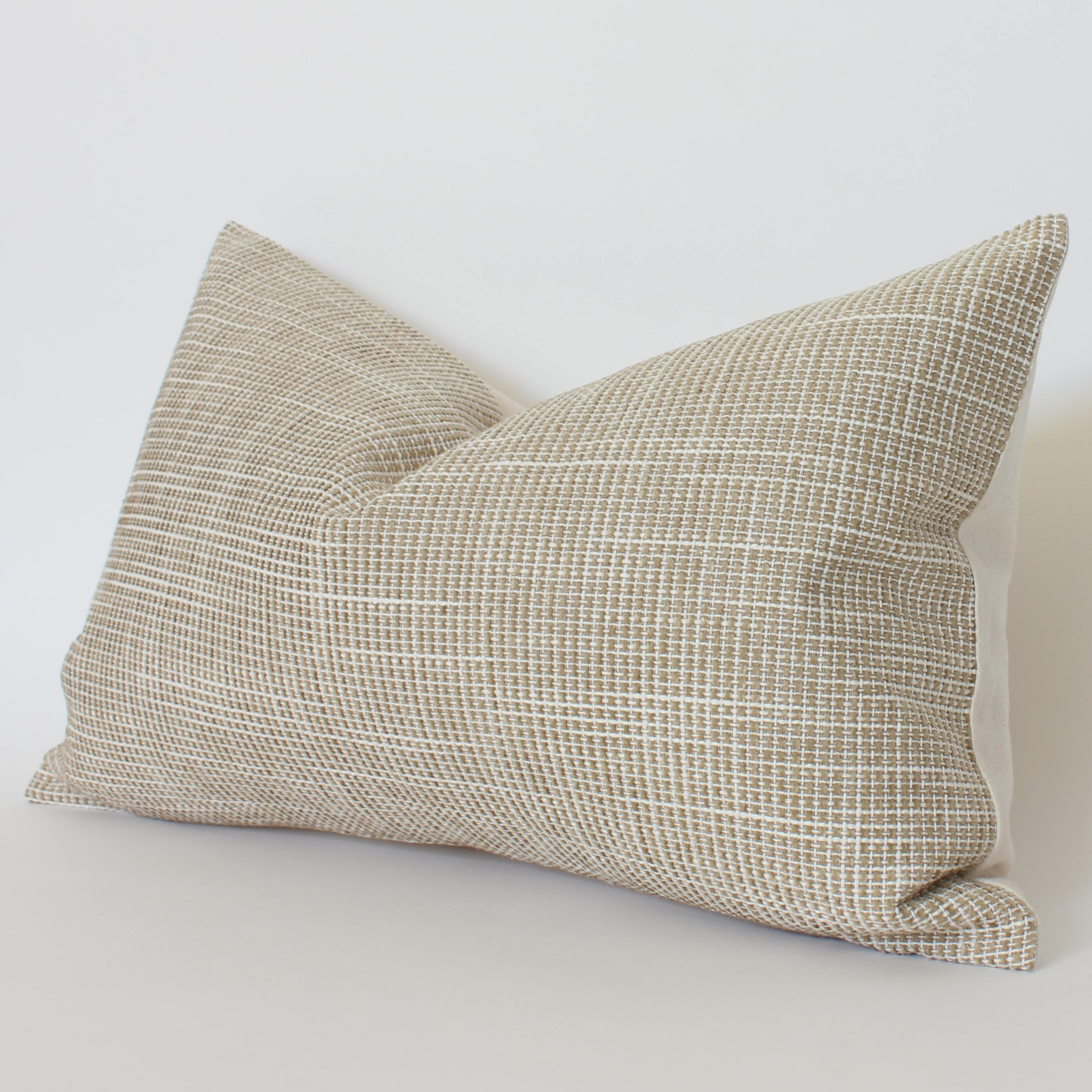 textured beige lumbar pillow