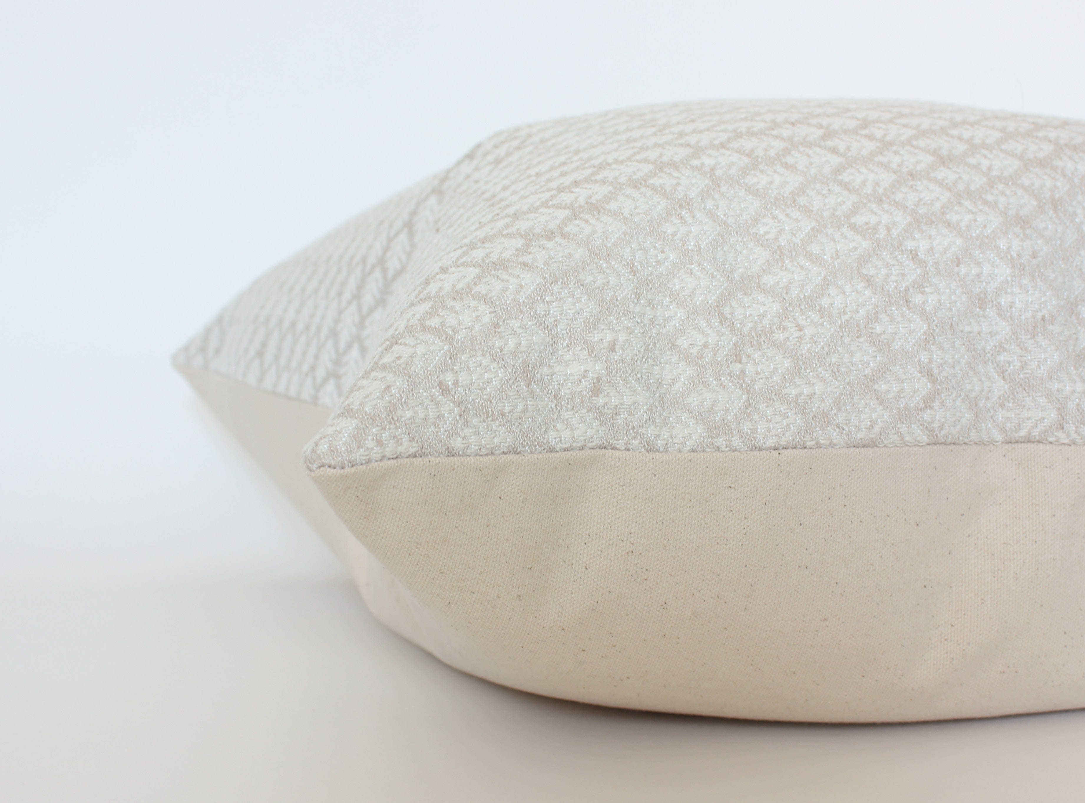 textured neutral sofa cushion