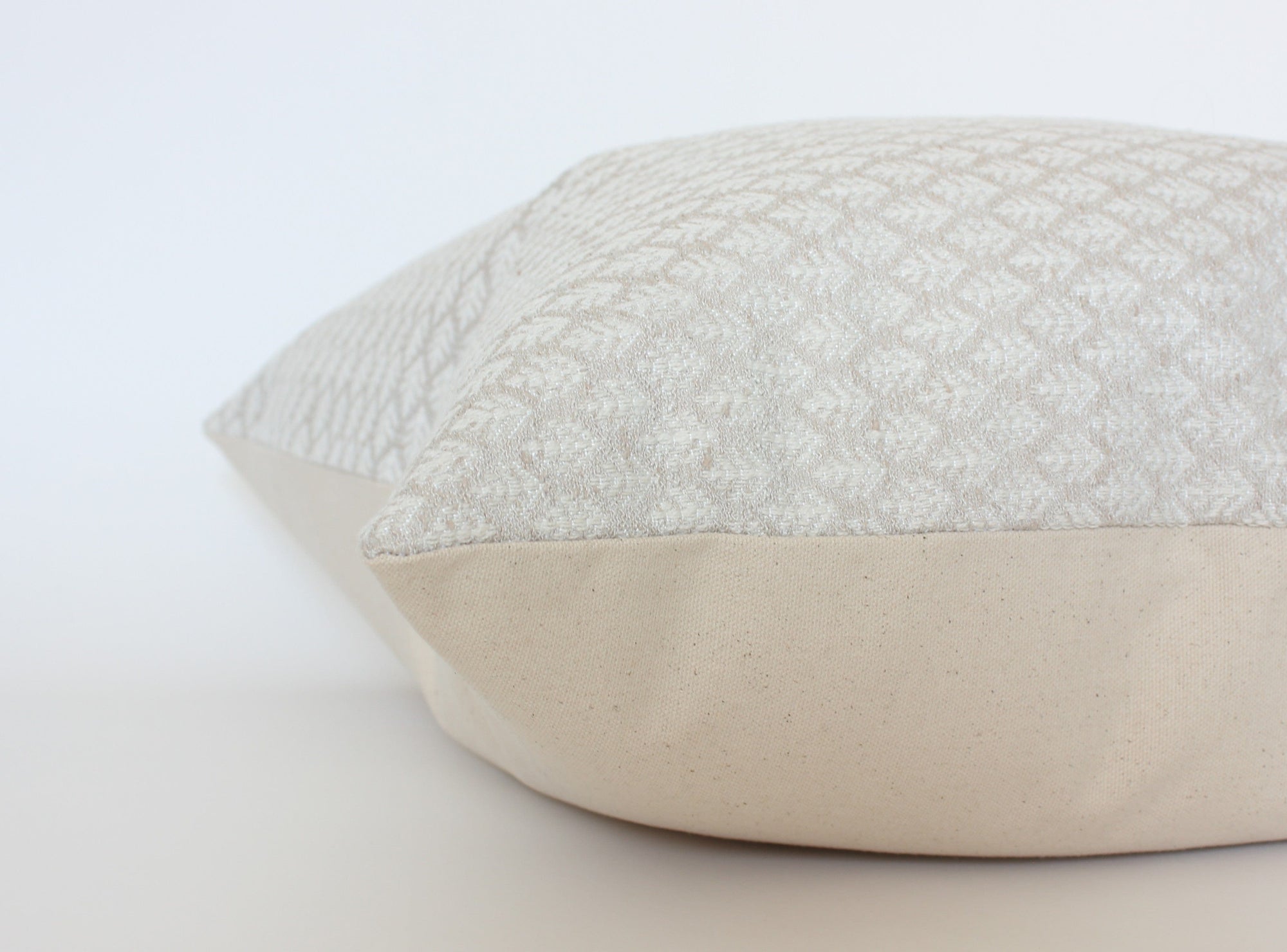 textured neutral sofa cushion