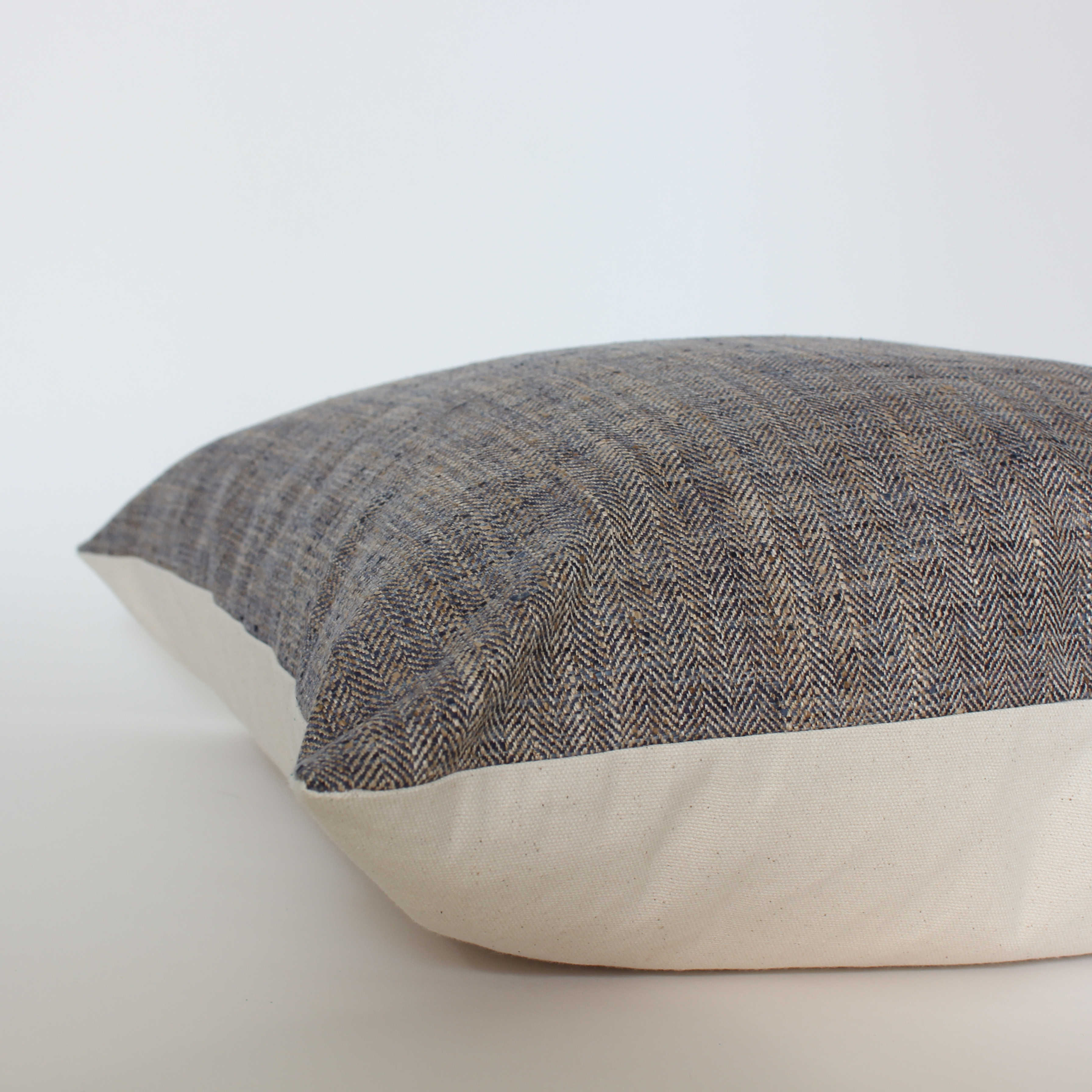 warm neutral brown  and blue textured pillow cover