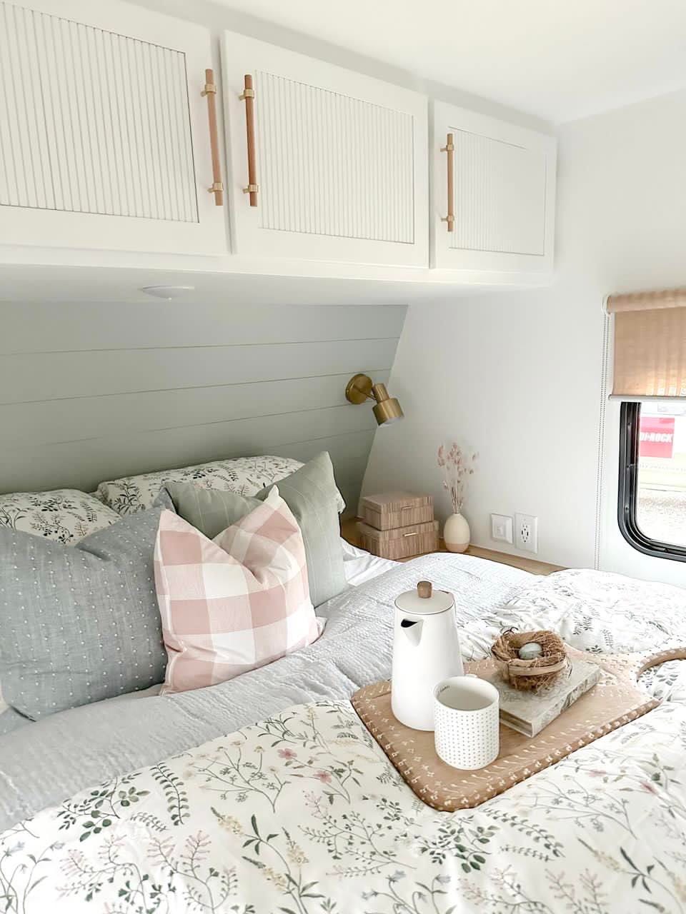 pastel pillow covers on bed