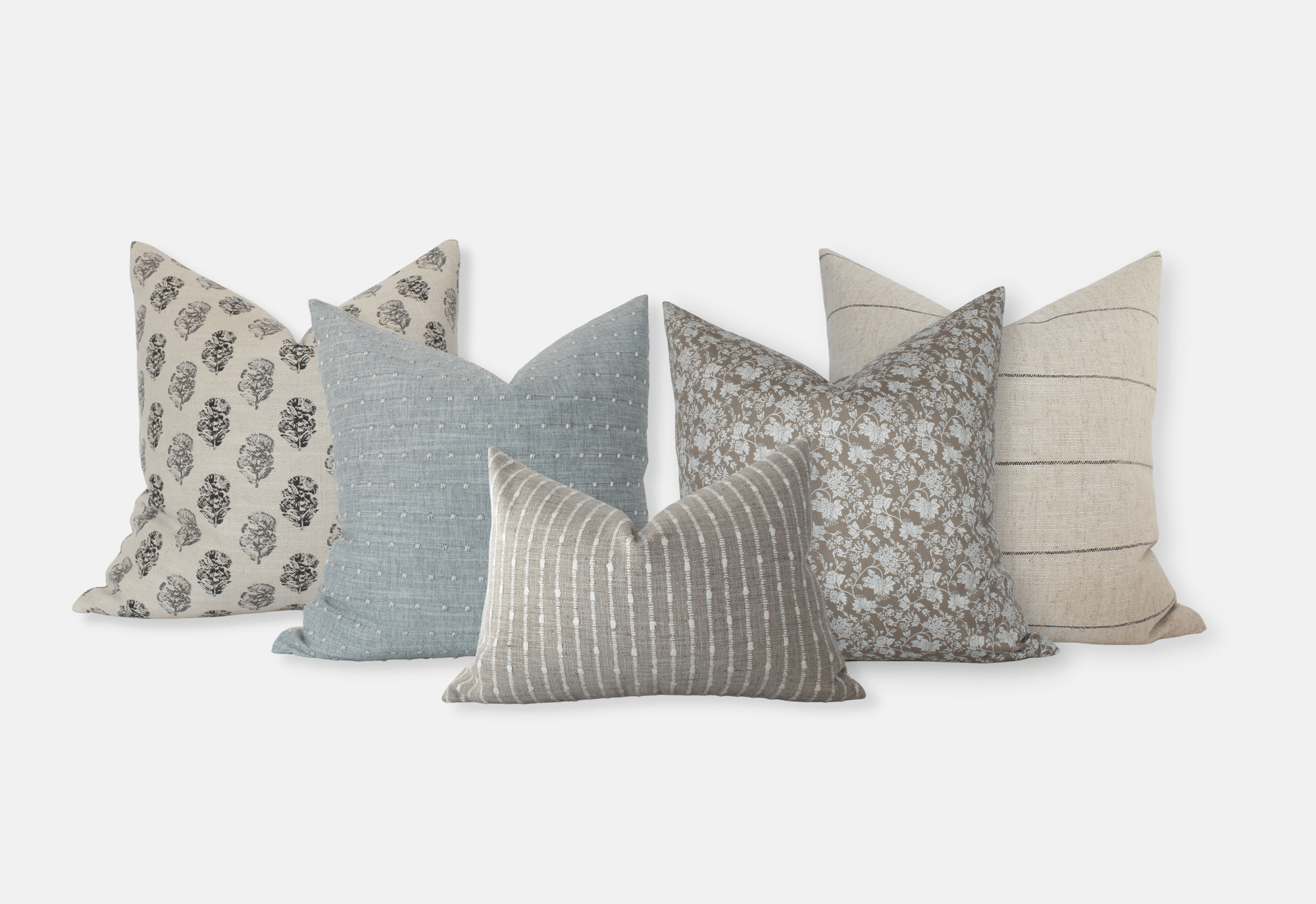 Neutral light blue sofa pillow combo