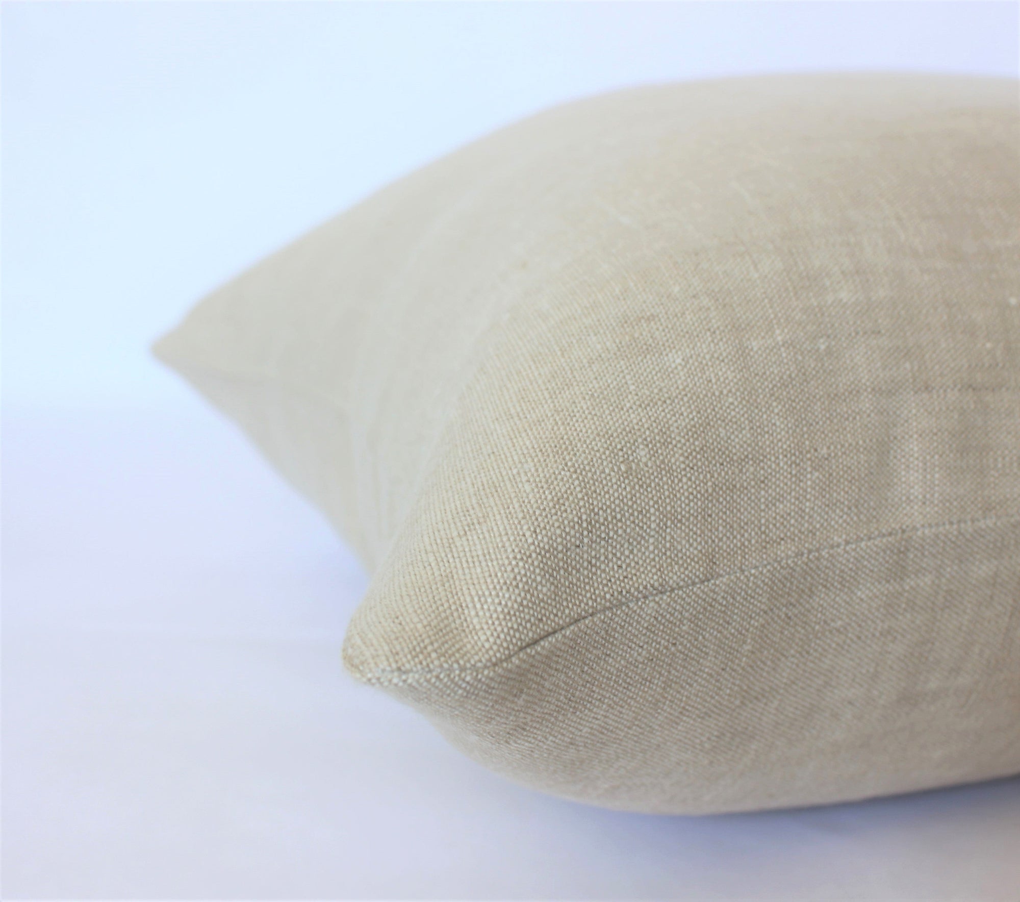 beige throw pillow