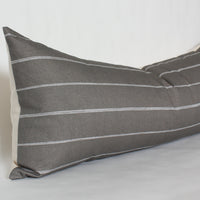 brown striped lumbar pillow for bed