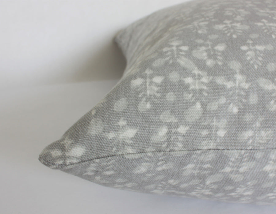 gray and white cushion