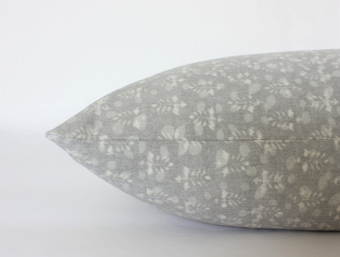 gray floral throw pillow